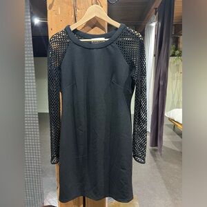 Nicole Miller dress with unique arm detail. In immaculate condition.